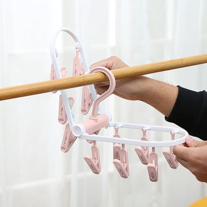 Portable Foldable Clothes Drying Rack, 20 Rotating Clips, Multi-Purpose Laundry Hanger for Underwear, Socks, Indoor/Outdoor Use, Compact, Lightweight, Convenient for Travel and Dorms (Pink)
