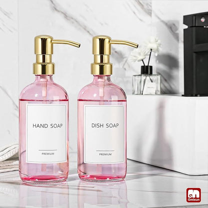 GMISUN Pink Soap Dispenser Bathroom, 2 Pack Kitchen Hand and Dish Soap Dispensers Set, 17 Fl Oz Pink Glass Soap Dispenser with Gold Pump, Refillable Modern Farmhouse Liquid Soap Pump Bottles