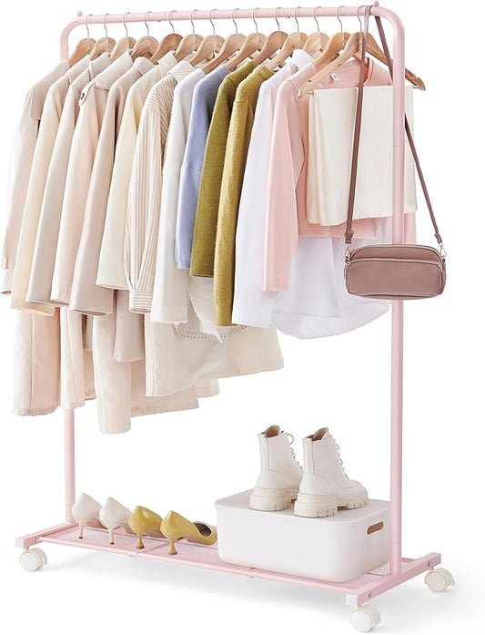 SONGMICS Clothes Rack with Wheels, Clothing Rack for Hanging Clothes, 25.4mm Metal Garment Rack with Dense Mesh Storage Shelf, 110 lb Load Capacity, 2 Brakes, Pink UHSR025P01