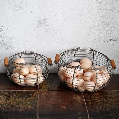 CVHOMEDECO. Round Wire Egg Baskets Rustic Fruit Baskets with Wooden Handles Primitives Vintage Gathering Basket. Rusty, Set of 2